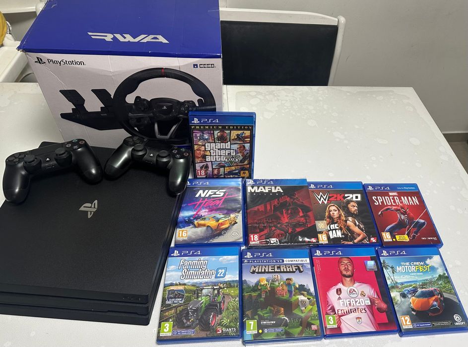 Vand Ps4 1TB cu9 jocuri volan si pedale