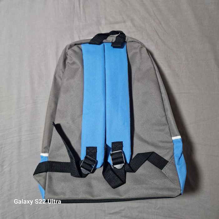 Vând rucsac din material textil cauciucat