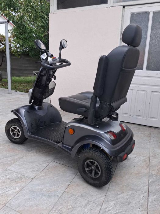 Scuter dizabilitati Kymco For U cu 4 roti 15km/h, 180kg, baterii 100Ah