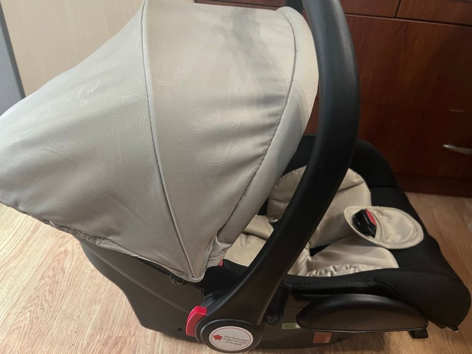 CHIPOLINO Стол за кола-кошница АМОРЕ I-SIZE (40-85 см) МАКАДАМИЯ