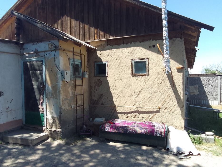 Часть дома в Кумшагале со стороны карьера