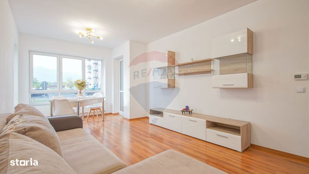 Apartament spațios cu grădină, vedere la munte și potențial comercial