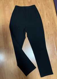 Pantaloni eleganti cu pense