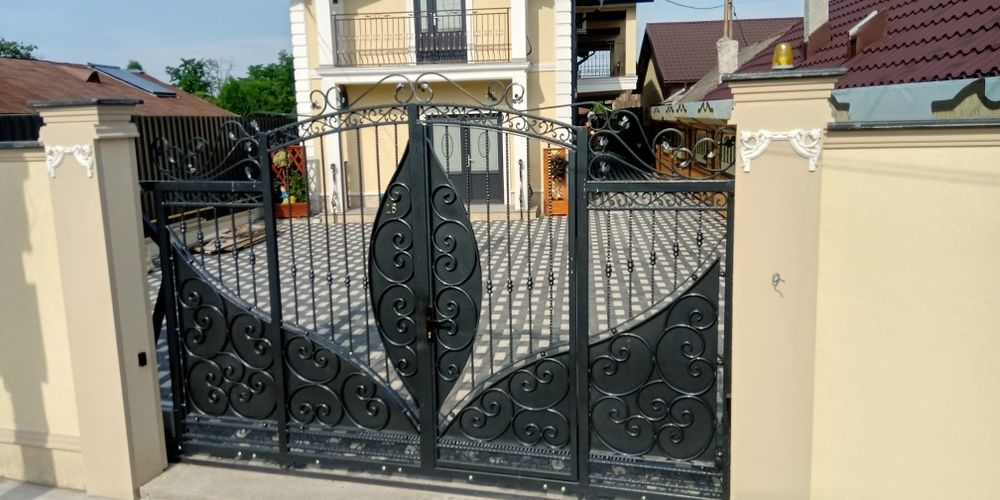 Porți,garduri,copertine ,scări din fier forjat