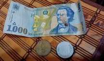 2 monede una de 500 de lei din anul1999 și una de 100 de lei cu mihai
