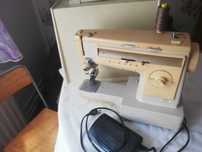 Mașina de cusut electrica Singer 533