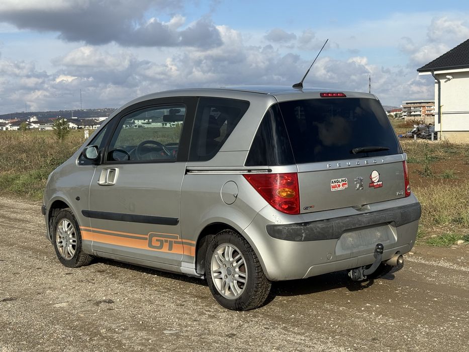 Peugeot 1007 • Diesel 1.4 • Usi automate