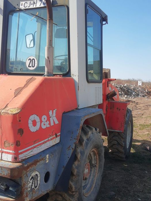 Vând încărcător frontal O&K L6
