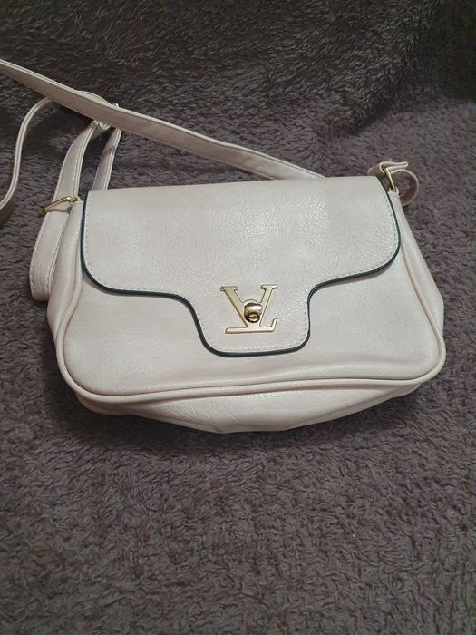 Много светло розова дамска чанта