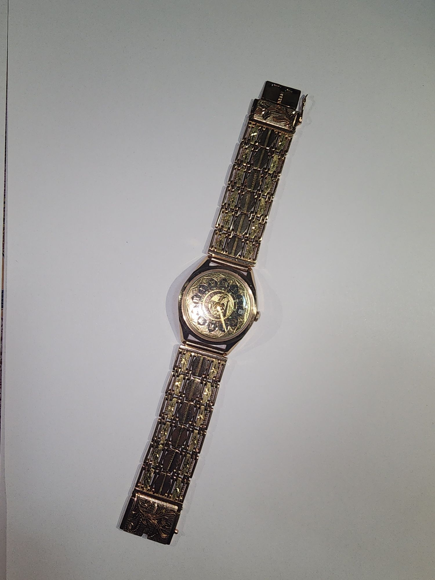 Золотые часы 105 гр