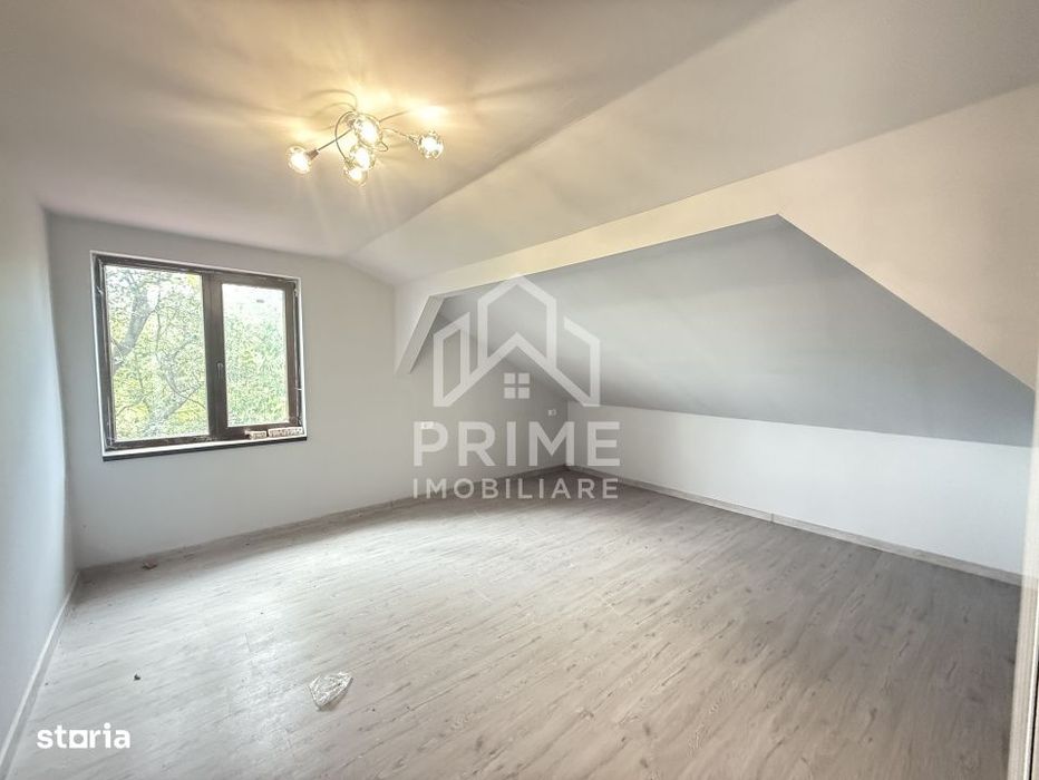 Casa cu 6 camere si gradina generoasa de vanzare in Benic