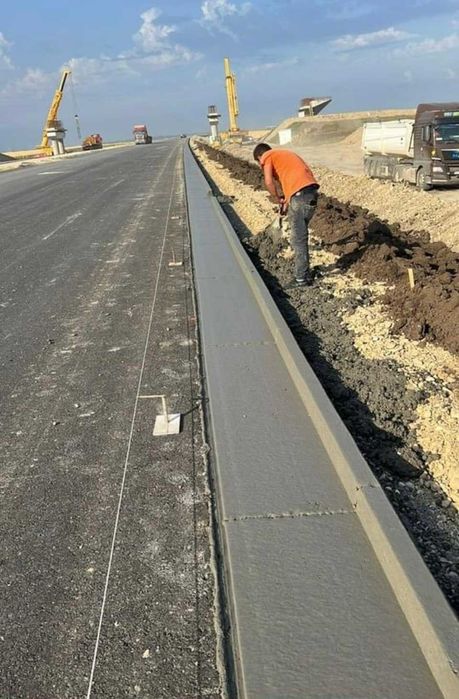 Santuri si rigole betonate  rigole de acostament realizate mecanizat