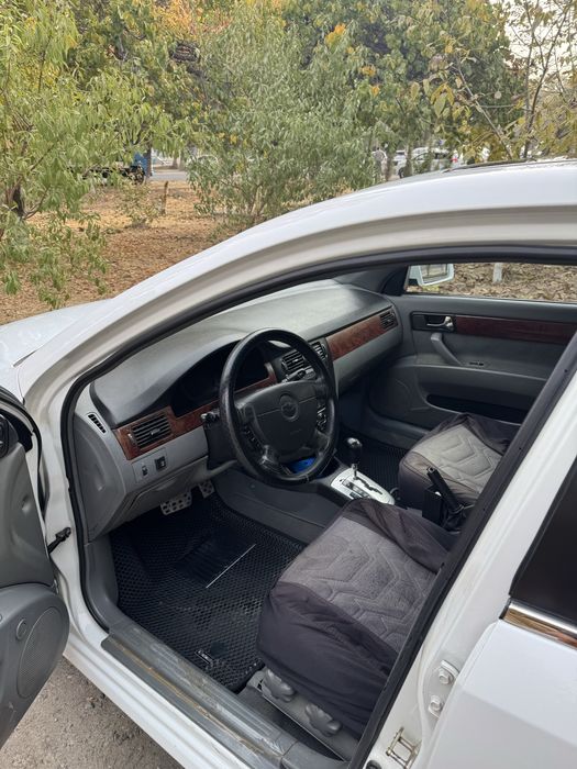 Срочна сотилади Ласетти 1.6 2013й Гентра килинган!