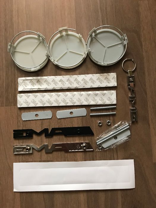 Emblema semn sigla logo grila fata portbagaj capace jante Mercedes AMG