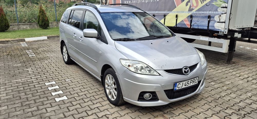 Vand MAZDA 5 din 2009 cu 7 locuri.
