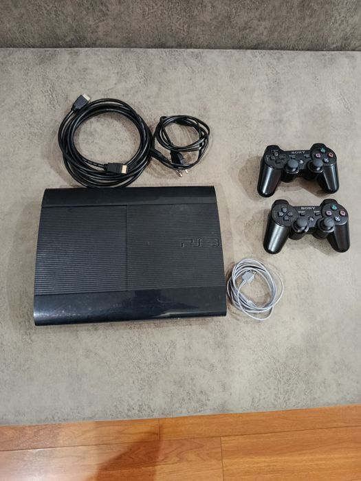 Consola PlayStation 3 SuperSlim Modata 500GB cu 2 controllere wireless