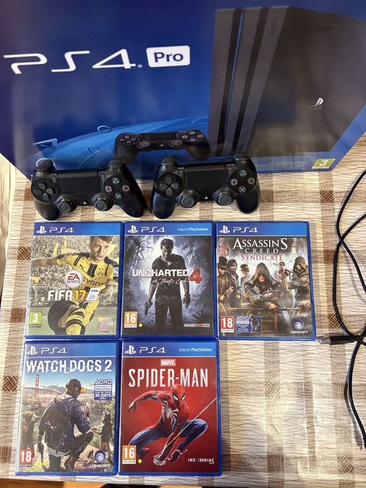 PlayStation 4 Pro 1TB - с подарък 6 игри