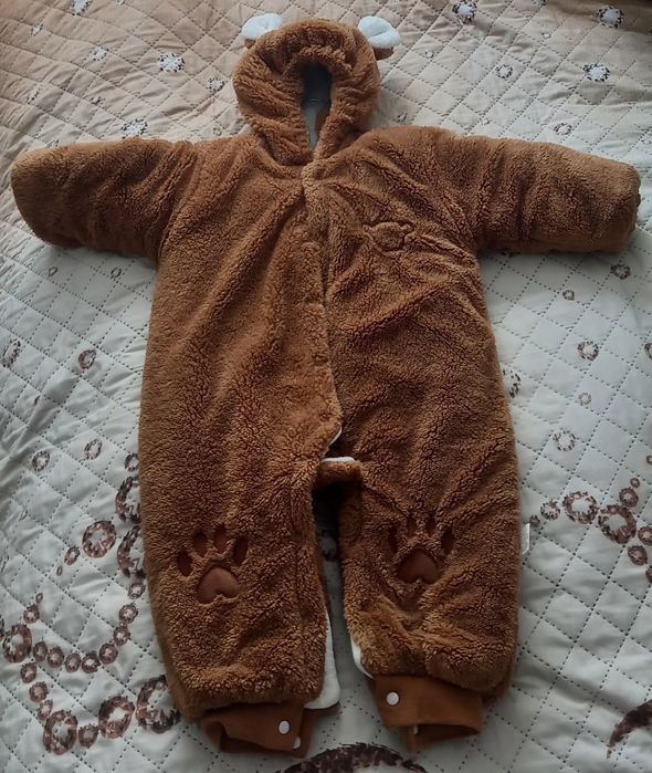 Продам новый теплый детский комбинезон.
