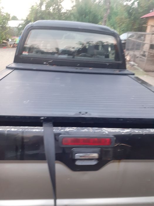 Rulou bena Mitsubishsi L200, inchidere bena
