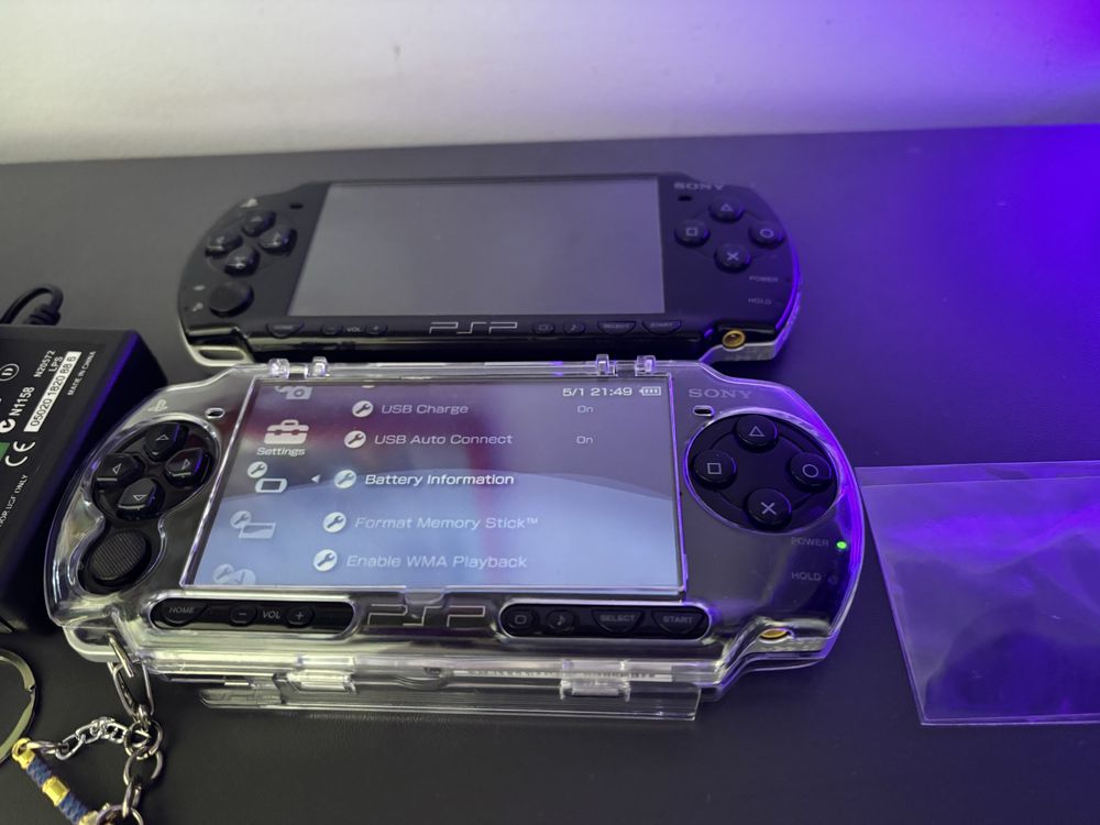 PSP MODAT + ACCESORII + peste 30 de jocuri + 5 UMD de colectie