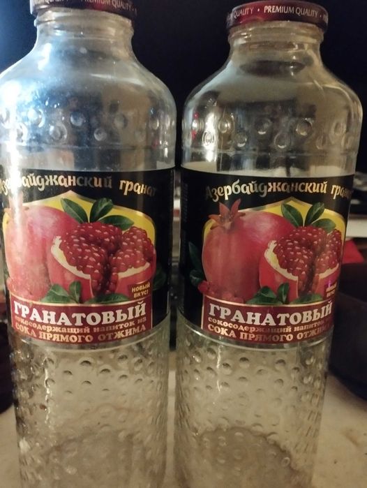Продаю стеклянные бутылочки 1 литр с завинчивающимися крышками