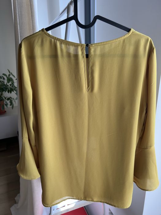 Motivi cămașă/bluza în stare perfectă.