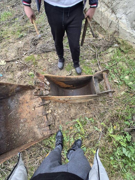 Cupe buldoexcavator caterpilar