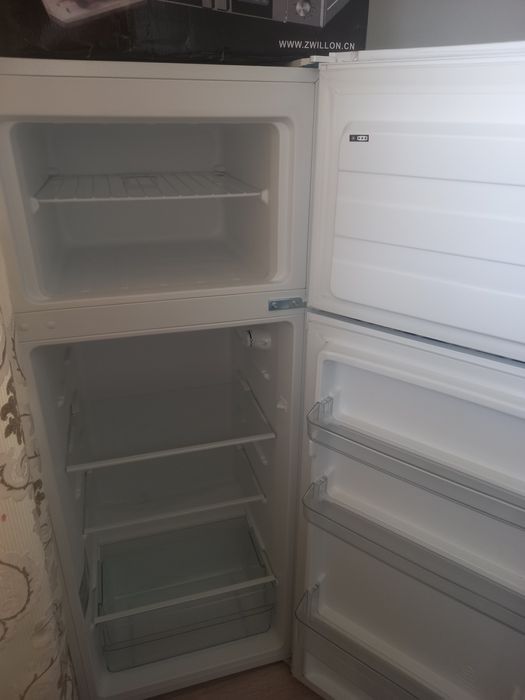 Продам холодильник почти новый