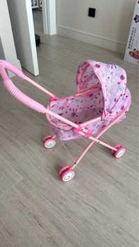 Розовая детская коляска