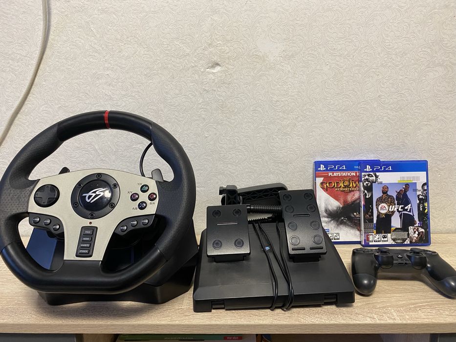 Руль,педали,джостик и 2 игры на Ps.