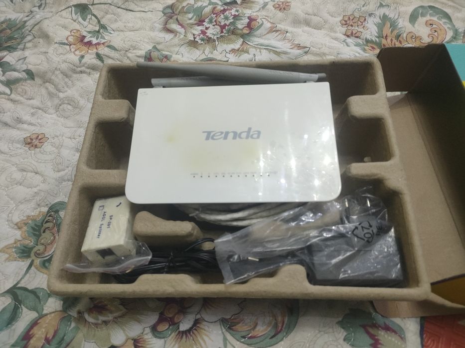 Модем ADSL2  и беспроводной маршрутизатор