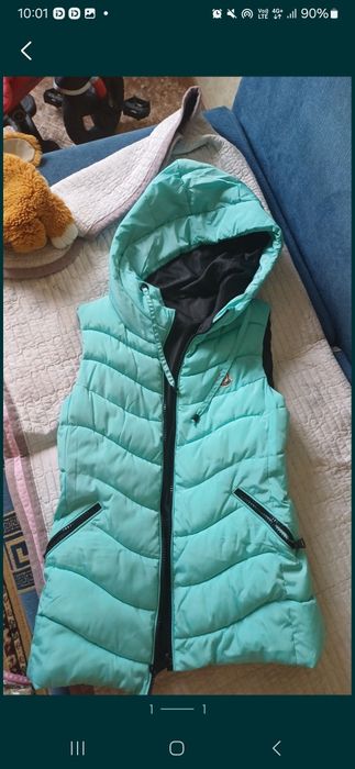 Продам жилетку новую