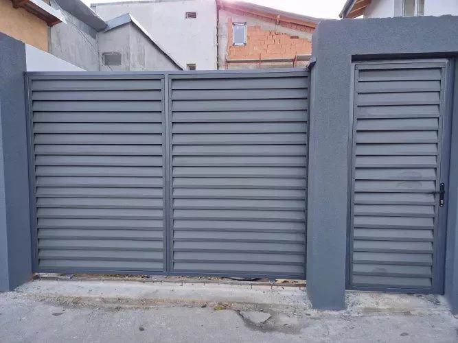 Executăm porți din șipcă metalică
