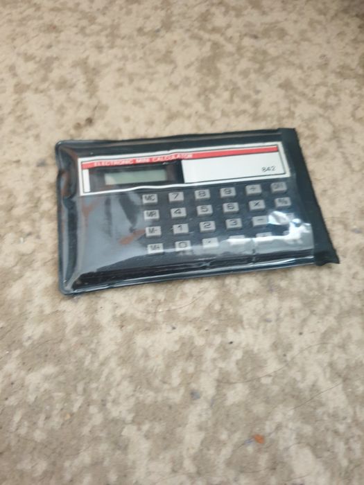 mini calculator electronic de epocă
