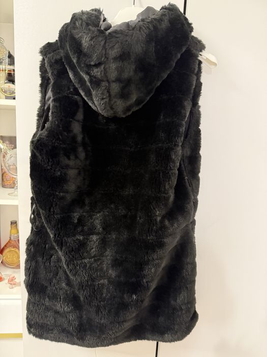 Vesta de blana .