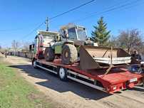 Tractări auto Alexandria platforma trailer transport utilaje agricole