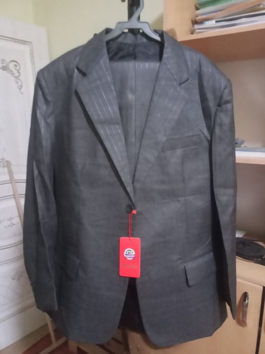 Продам костюм новый 54 размер чехолмен
