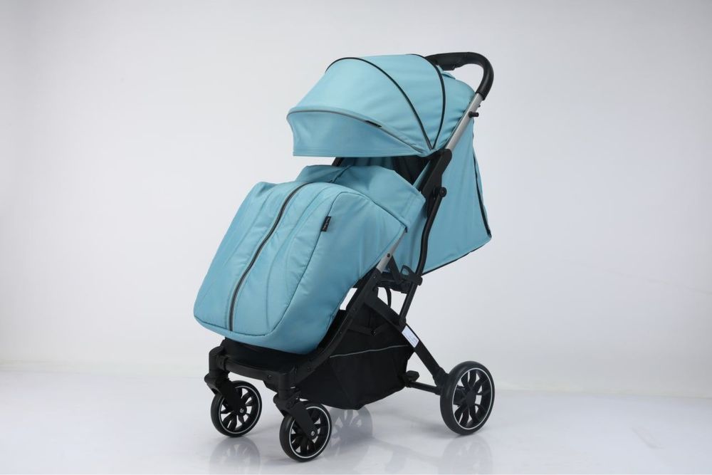 Прогулочная детская коляска чемодан