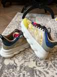 Versace chain reaction baroque yellow