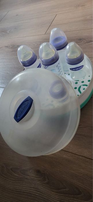 Бутылочки для кормления Lansinoh (антиколиковая), стерилизатор