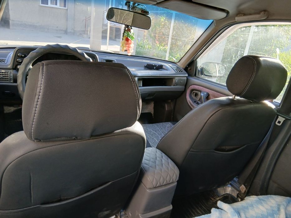 Нексия 1,2003-йил, оқ ранг, метан-бензин, краска радной, аъло холатда