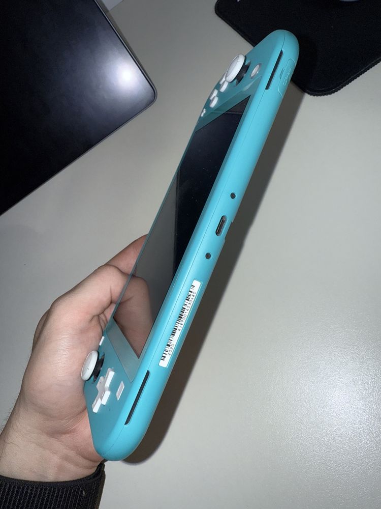 Nintendo Switch lite, turcoaz, functioneaza impecabil + husa + folie