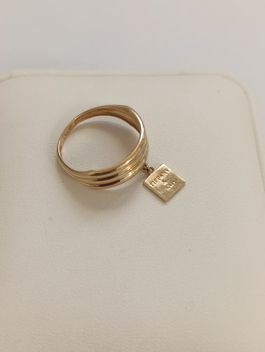 золотая кольцо, Италия бренд TIFFANY . Проба 585 гр, вес 2,10. Р 18.