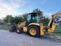 Buldoexcavator Komatsu WB