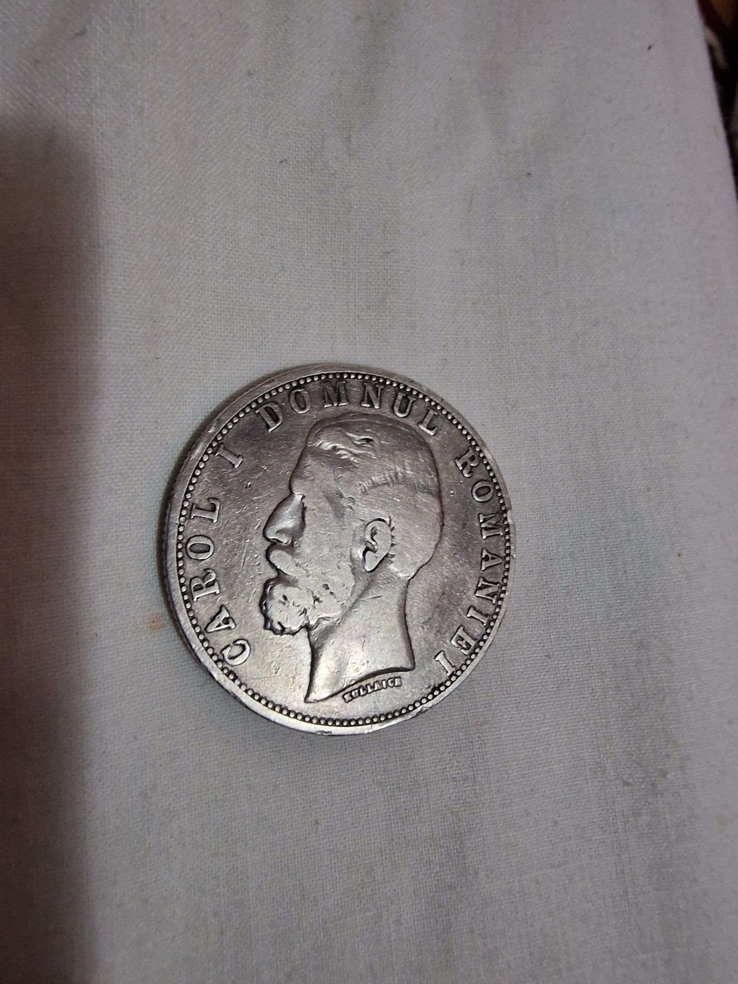 Moneda veche de argint