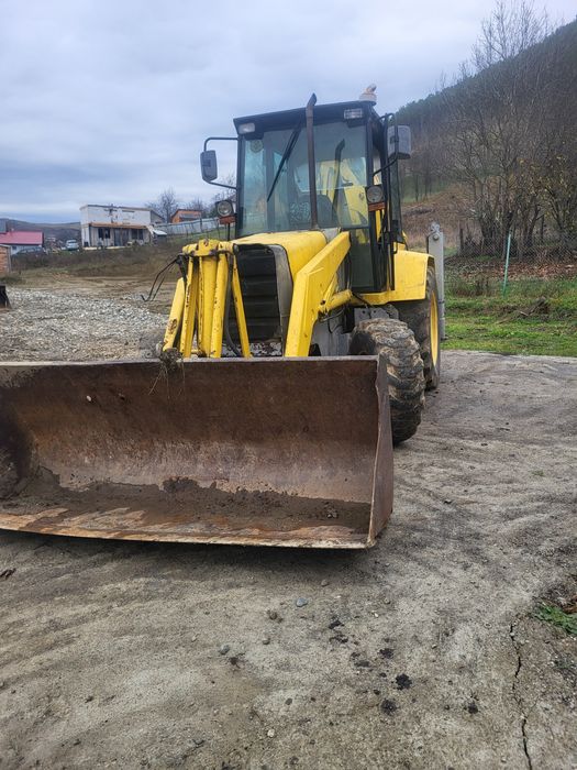 Vand buldoexcavator mf 750