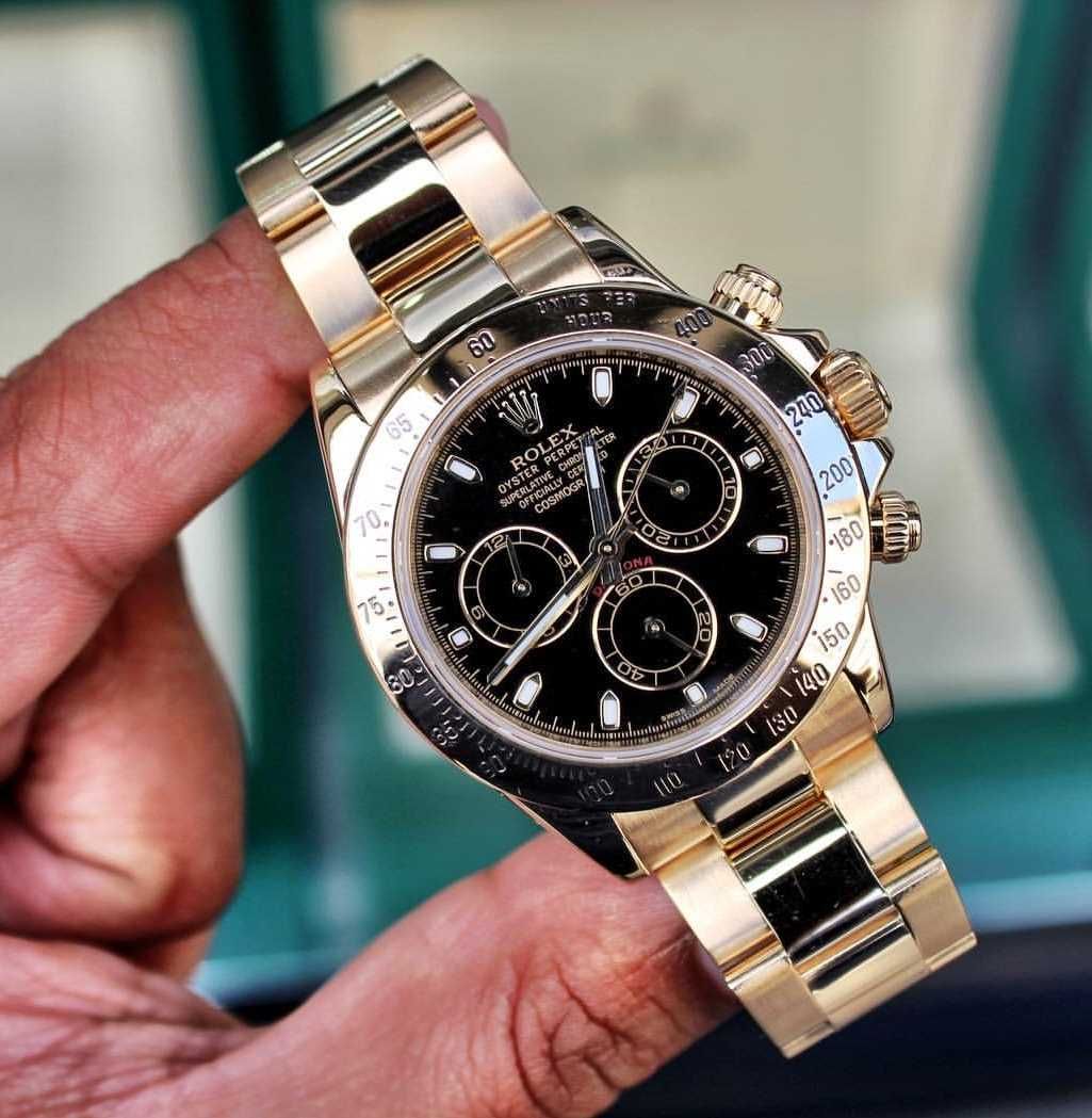 Часовници Rolex Daytona златно/черно