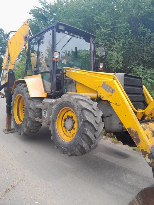 Dezmembrez buldoexcavator terex mf fermec 965 750 860
