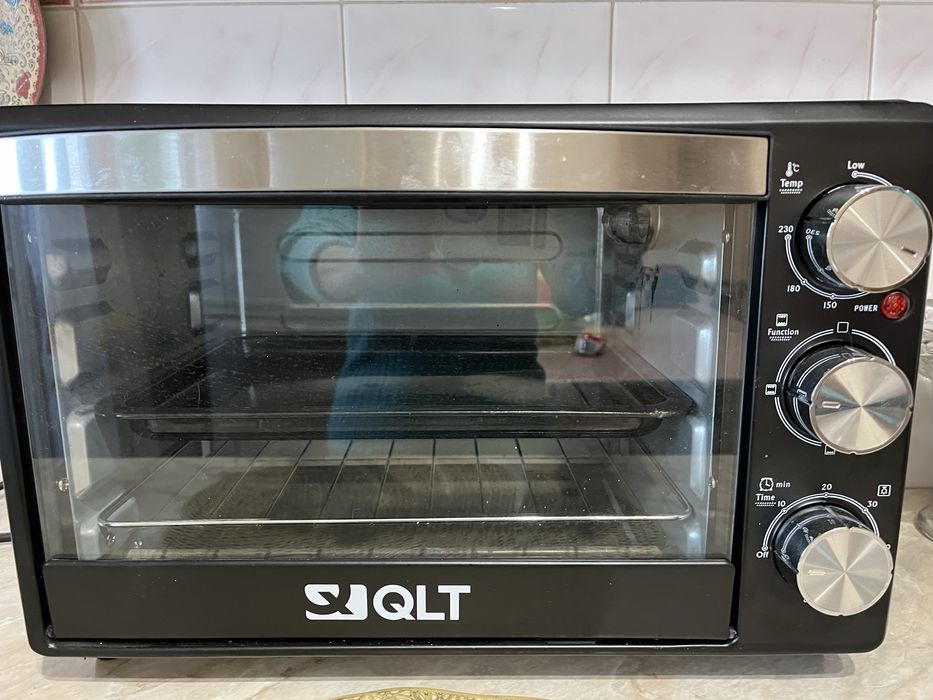 Электропечь  QLT , компактная.Новая.