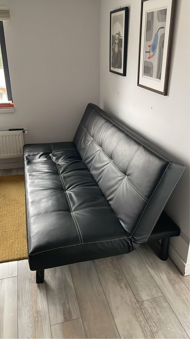 Canapea extensibila, cu un arc sarit